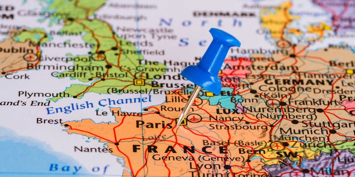 map of france with a pin on paris