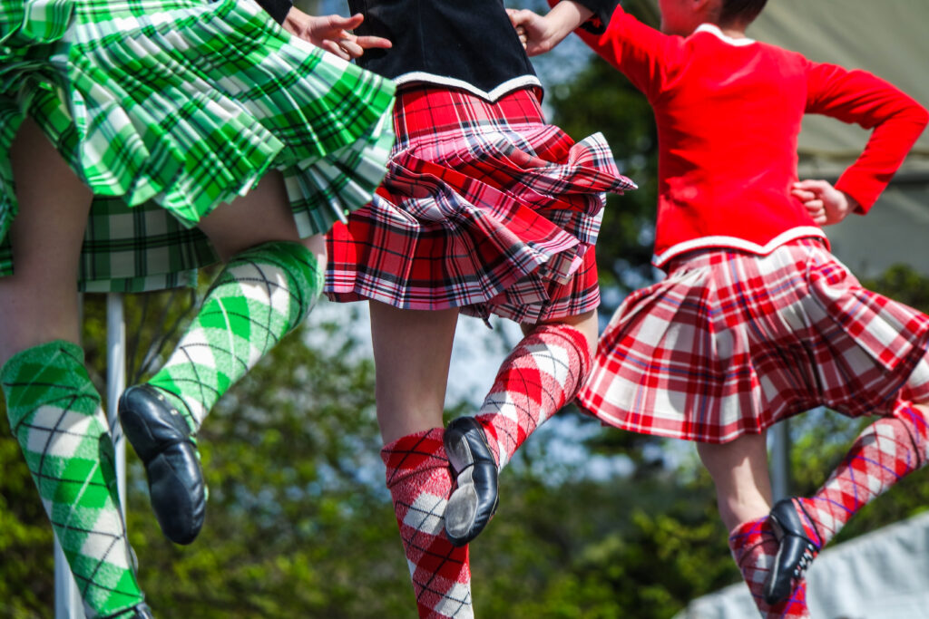 Highland dancer at highland games in scotland, UK