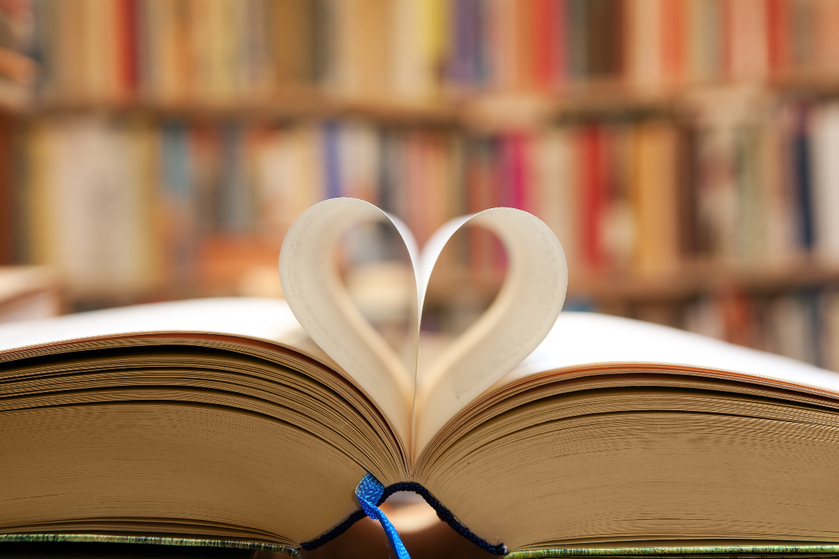 book with pages folded to shape like a love heart