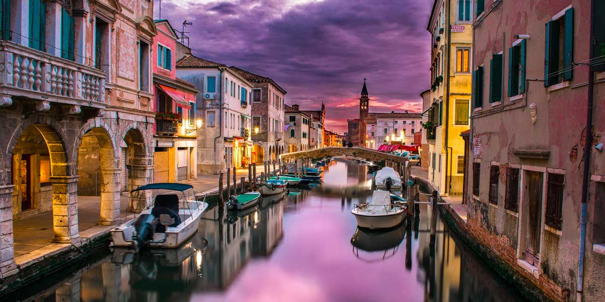 italian canal with purple sky